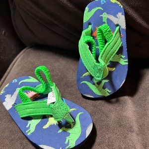 Carter’s dinosaurs flip flops/ sandals. Size XXS 1-2